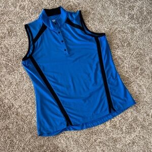 Tail blue and black sleeveless golf shirt.
